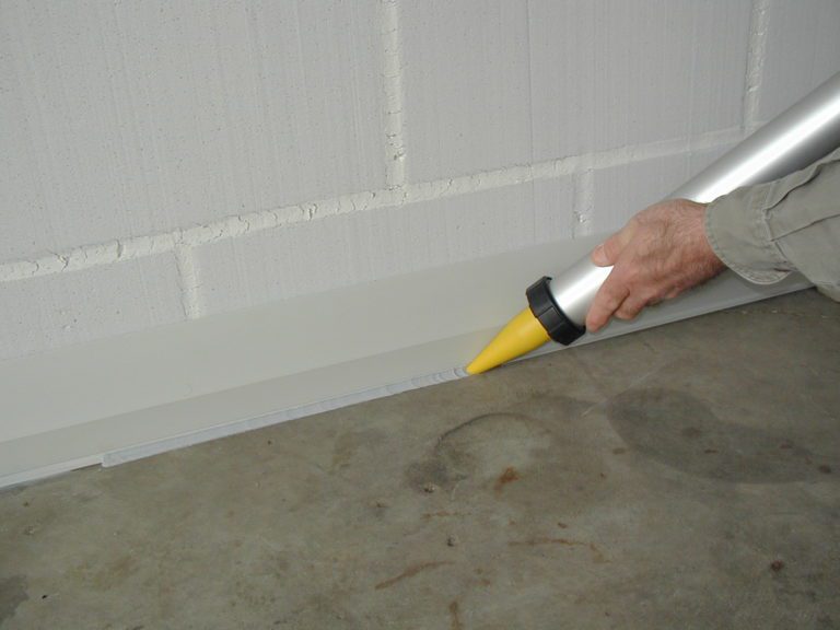 ProSealOnce Waterproofing Adhesive Bonds Vinyl to Concrete Basement